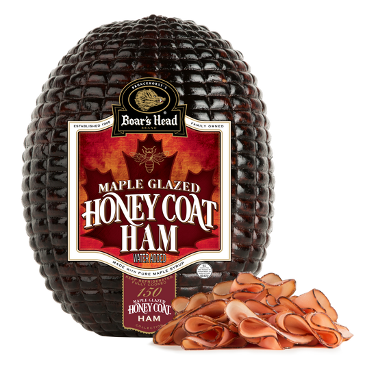 Boar's Head Maple Glazed Honey Coat Ham in a dark glazed bark-style package, shown on a white background with slices of the ham placed in front.