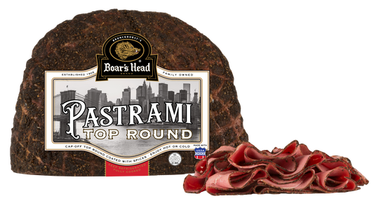 A package of Boar's Head Pastrami Top Round salami shown with the sliced meat piled in front on a plain white background.