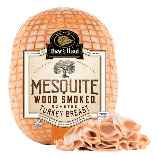 A packaged roasted turkey breast labeled Boar's Head Mesquite Wood Smoked, shown on a white background with sliced pieces placed in front.