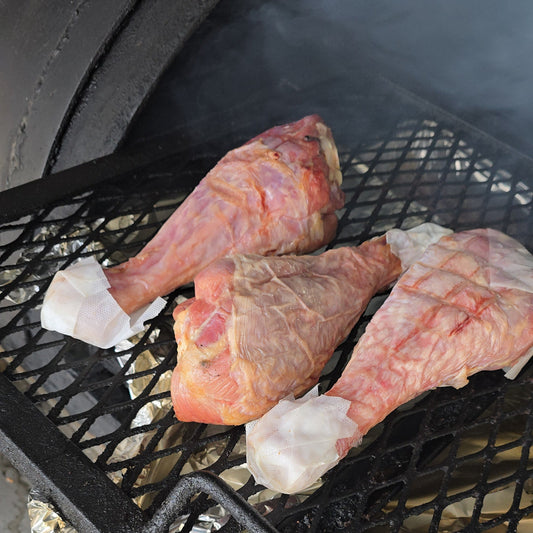 Raw Turkey Legs on the smoker